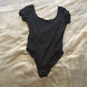 Black bodysuit with round neckline